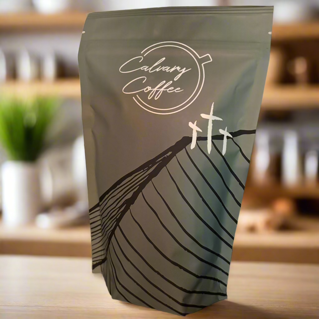 Calvary Coffee bag in a kitchen not in focus